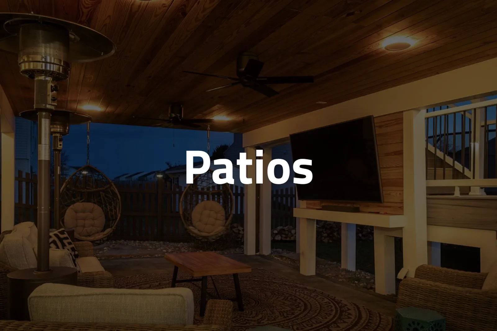 cozy-outdoor-patio-with-hanging-chairs-and-tv-va